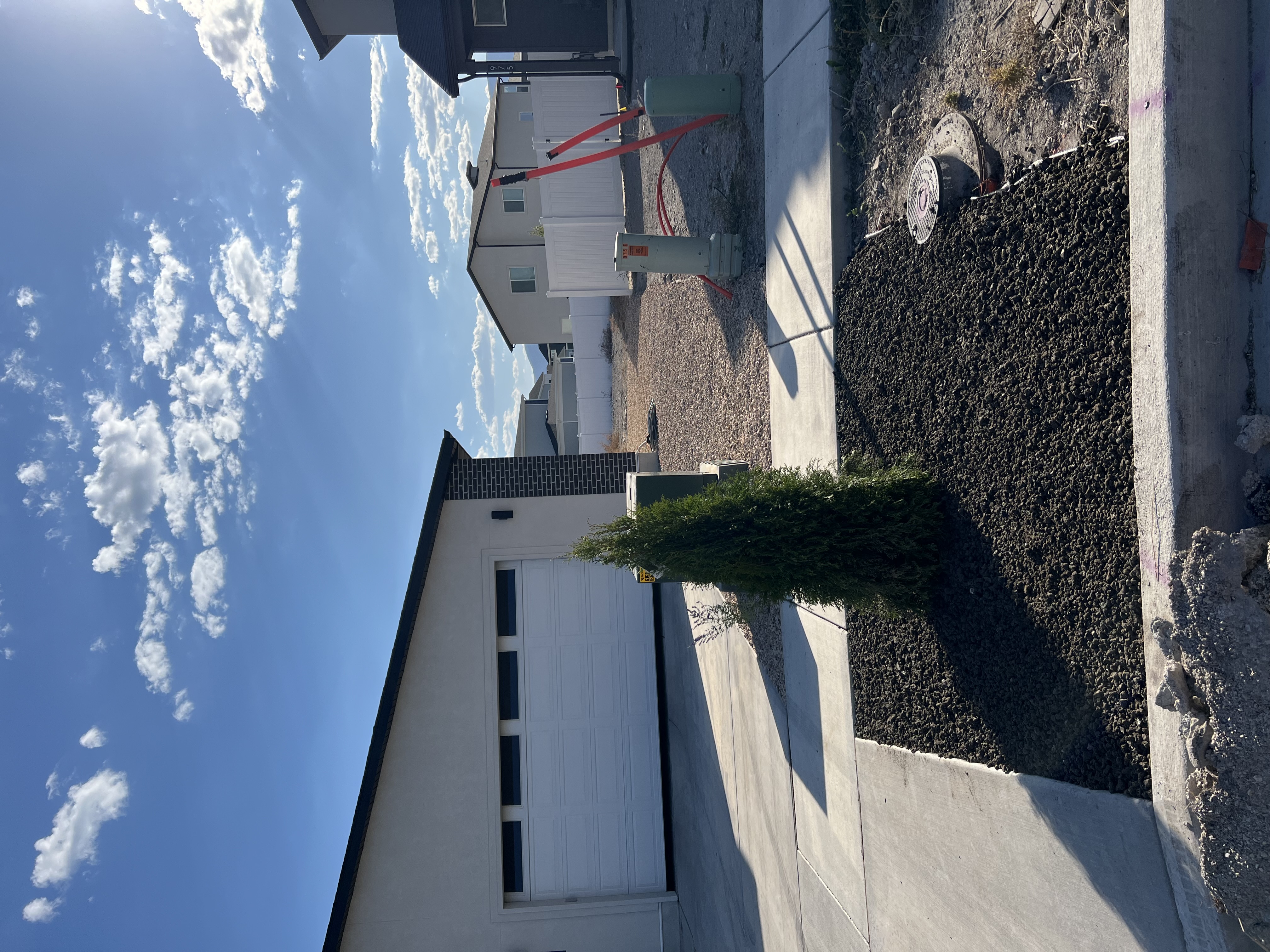 Side yard after rock landscaping cleanup and installation in Utah