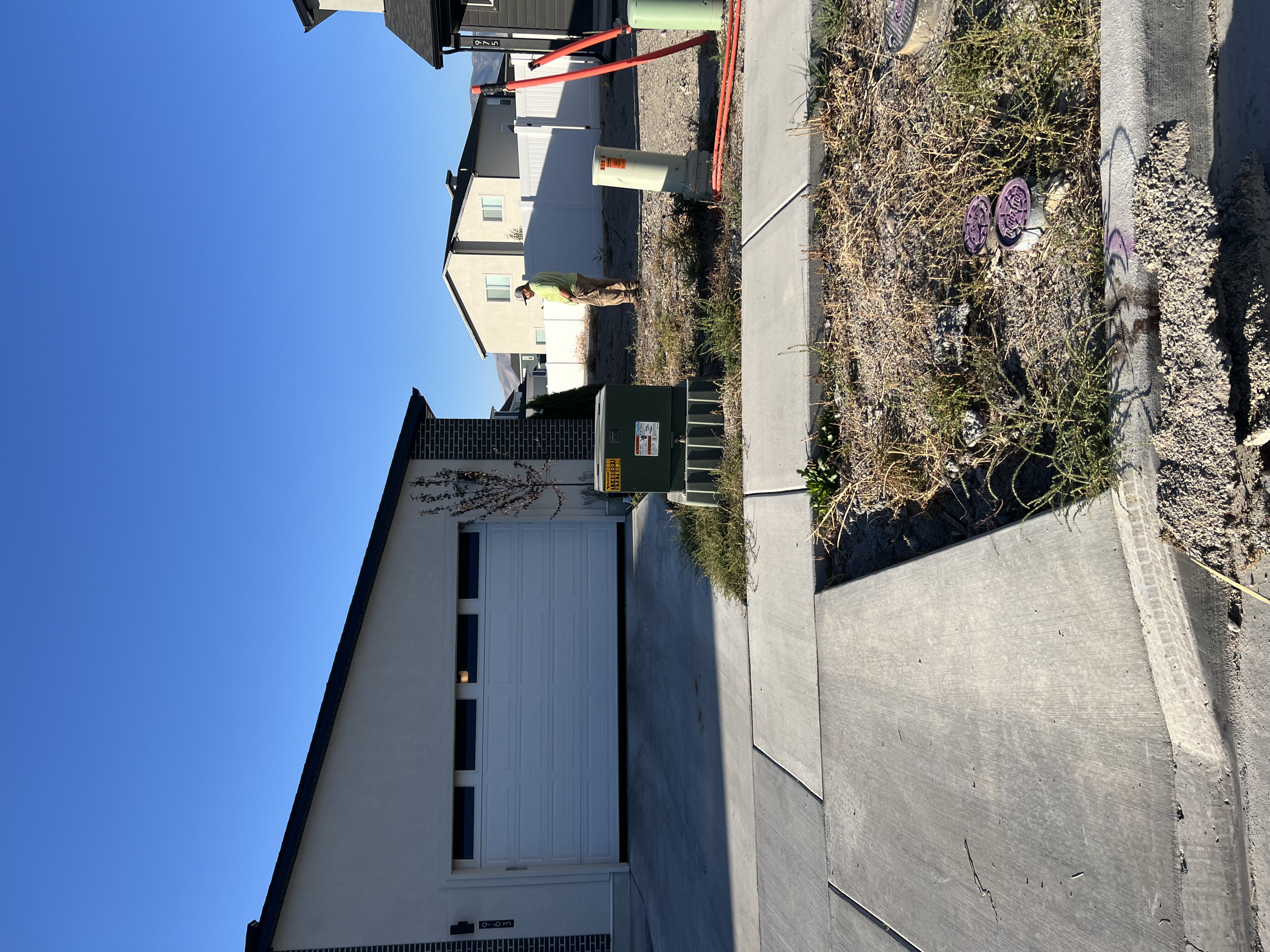 Side yard before rock landscaping cleanup in Utah